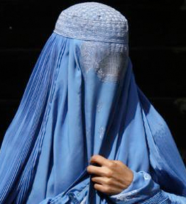 Muslim woman in burqa.